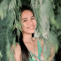 ilustrasi perempuan tersenyum/Photo by John Lloyd Monterde from Pexels