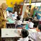 Program Pembiasaan Makan Bergizi Gratis (MBG) di Sekolah Dasar Negeri (SDN) Rawa Kompeni mendapatkan sambutan positif dari siswa dan guru. (Istimewa)