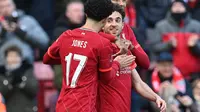 Striker Liverpool Diogo Jota merayakan gol ke gawang Cardiff City pada babak IV Piala FA 2021/2022 di Anfield, Minggu (6/2/2022). (AFP/Paul Ellis)