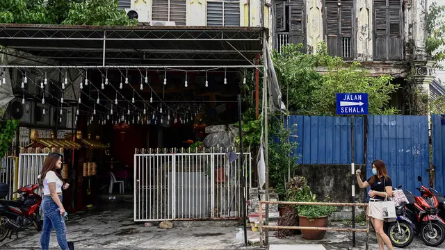 Aktivitas Warga Penang Malaysia di Tengah Peringatan Gelombang Kedua Covid-19