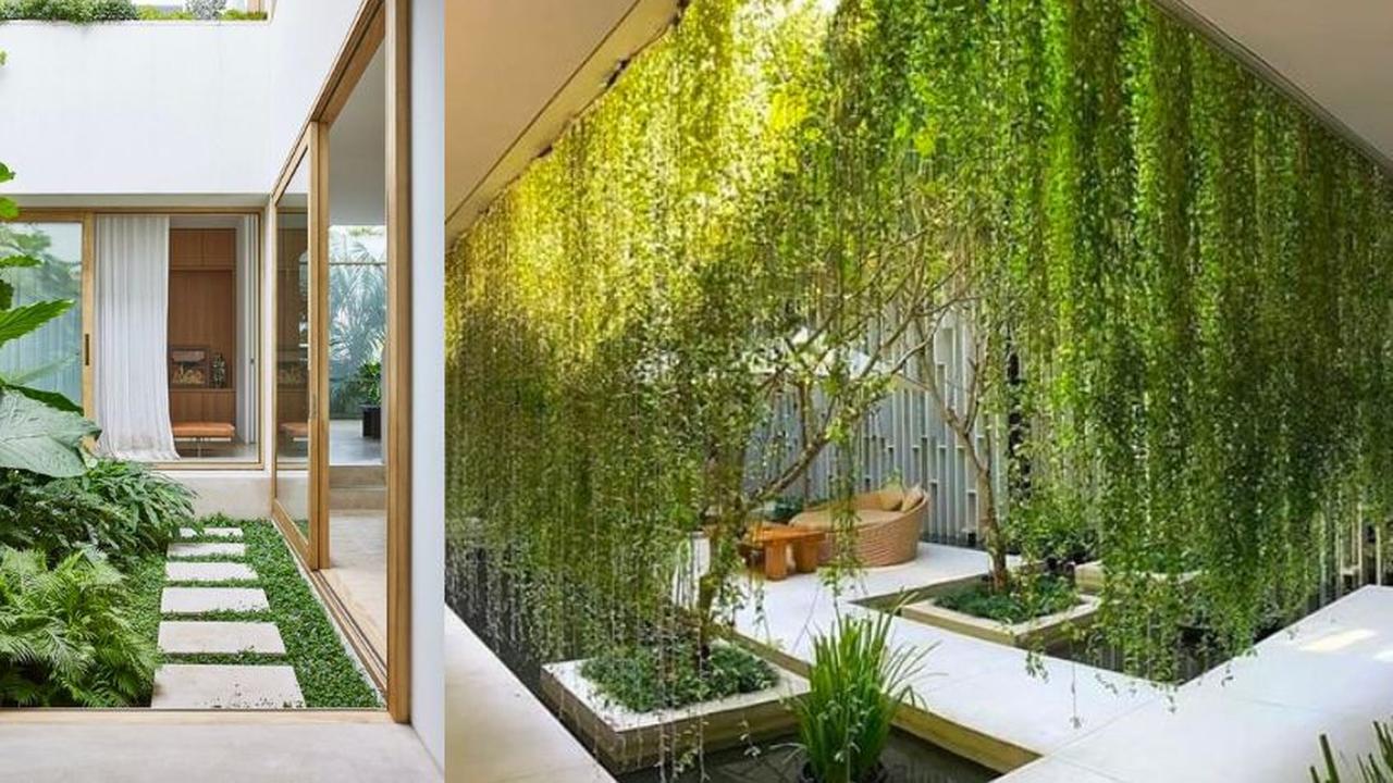 1. Rumah Tropis Modern dengan Taman
