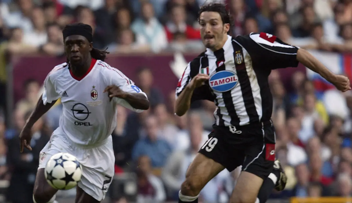 Clarence Seedorf. Gelandang Belanda yang kini berusia 46 tahun dan telah pensiun pada Januari 2014 bersama Botafogo ini total 5 kali berlaga di final Liga Champions, 1 kali bersama Ajax Amterdam pada musim 1994/1995, 1 kali bareng Real Madrid (1997/1998) dan 3 kali bersama AC Milan (2002/2003, 2004/2005 dan 2006/2007). Ia berhasil memenangkan 4 di antaranya. Satu-satunya kekalahan di final terjadi di musim 2004/2005 saat AC Milan takluk dari Liverpool lewat adu penalti. (AFP/Odd Andersen)