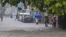 Badai itu diperkirakan akan mendarat pada hari Rabu di sisi selatan Hispaniola, pulau yang dimiliki oleh kedua negara, kata Pusat Badai Nasional AS.