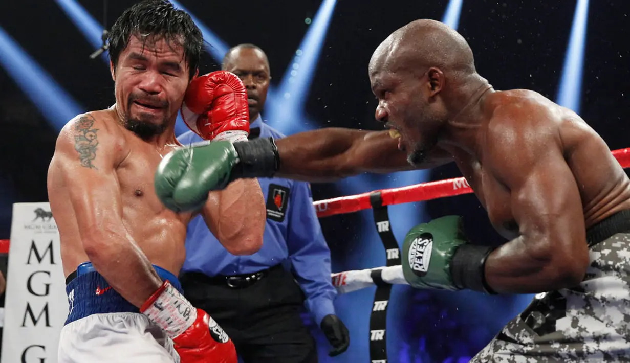 Manny Pacquiao (kiri) vs Timothy Bradley (REUTERS/Steve Marcus)