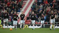 Ekspresi pemain MU setelah kalah dari Sunderland dalam laga Liga Inggris di Stadium of Lights, Sunderland, Sabtu (13/2/2016) malam WIB. (AFP/Oli Scarff)