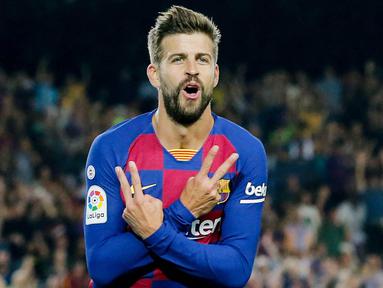 Gerard Pique - Bek tangguh ini merupakan salah satu produk terbaik yang pernah dihasilkan La Masia. Pemain yang sempat disia-siakan MU ini akhirnya pulang ke Camp Nou dan meraih segudang trofi bersama Barcelona. (AFP/Pau Barrena)