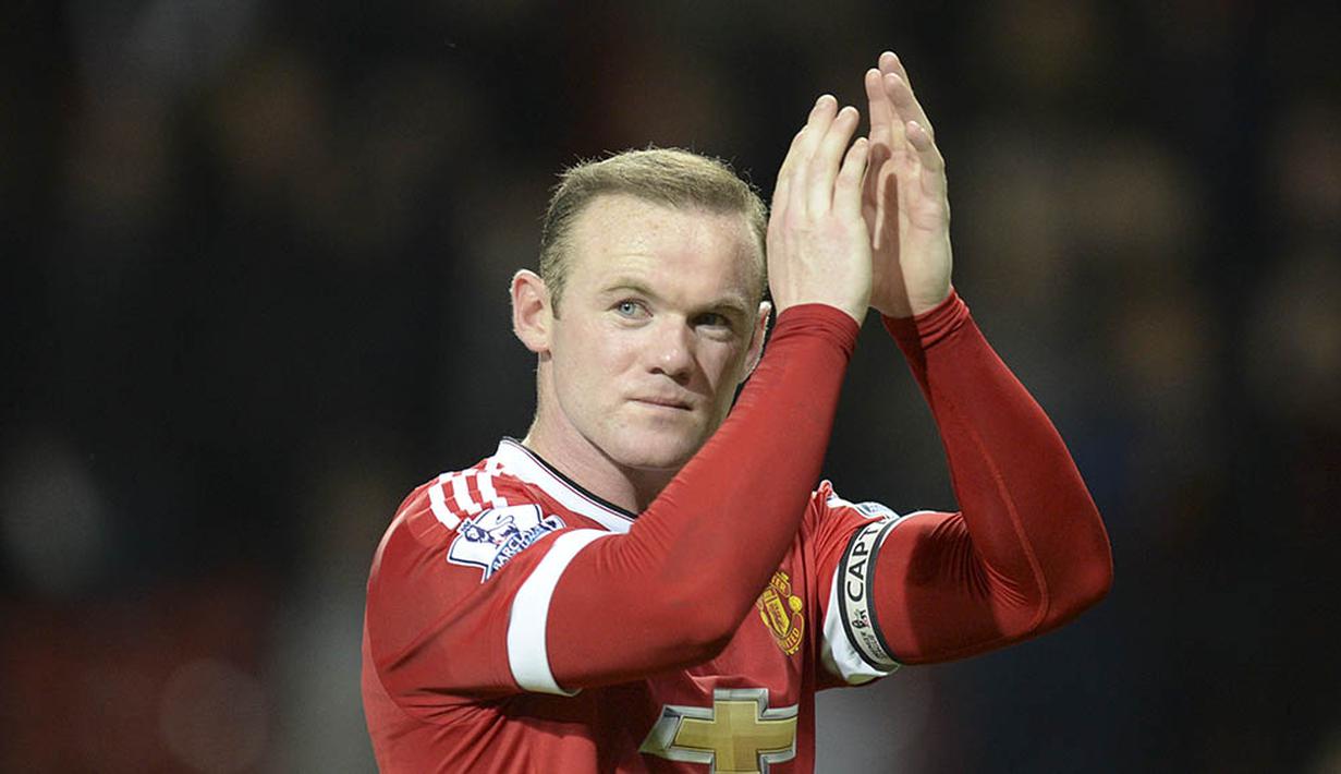 8. Wayne Rooney (2014-sekarang), bomber yang memecahkan rekor gol bersama Manchester United. Namun sayang saat didaulat menjadi kapten penampilannya justru menurun. (AFP/Oli Scarff)