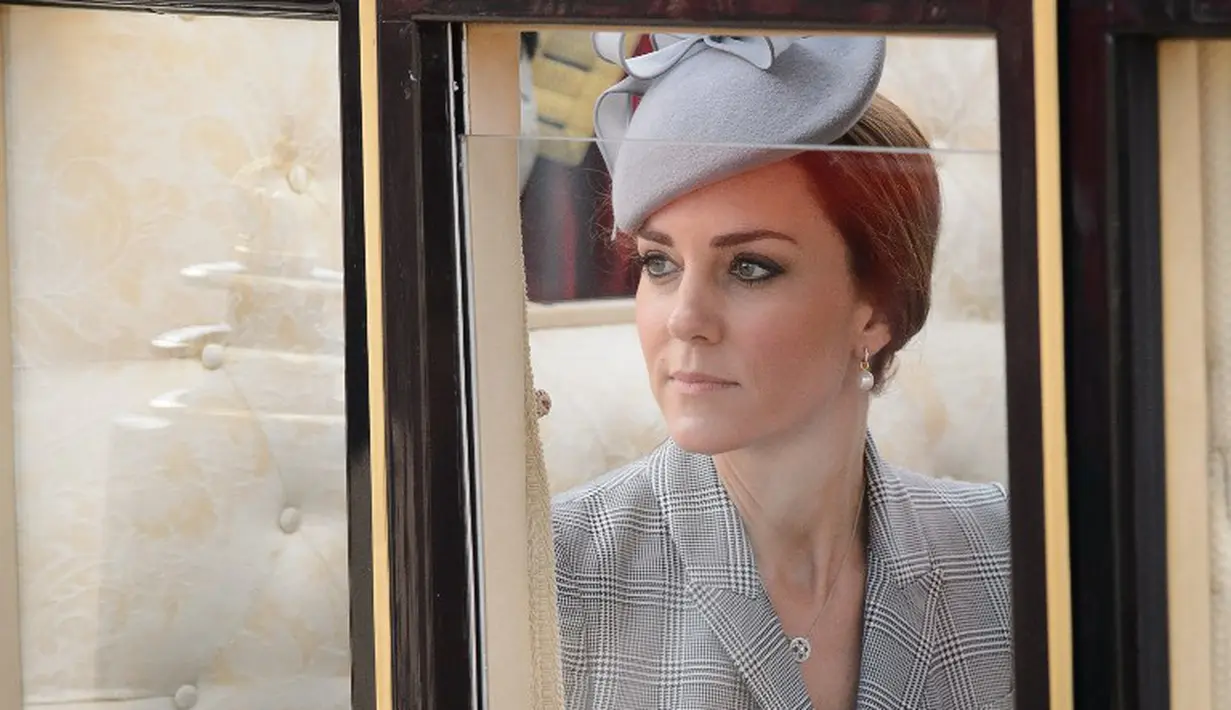Seperti halnya pada kehamilan pertama, Kate Middleton kali ini juga menderita mual-mual parah. (AFP PHOTO/POOL/Leon Neal)