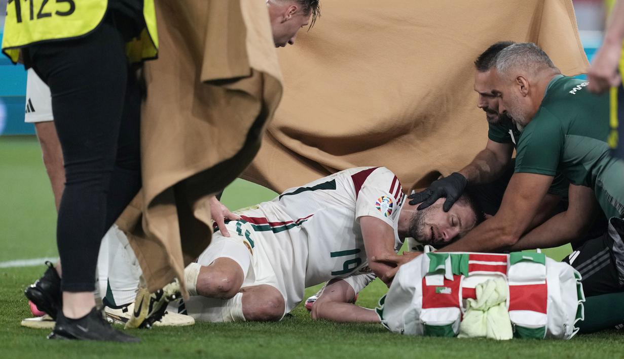 Hungaria sendiri menang 1-0 atas Skotlandia dalam pertandingan itu berkat gol Kevin Csoboth pada masa injury time, tepatnya menit ke-90+10. Hungaria finis ketiga di Grup A Euro 2024. (AP Photo/Antonio Calanni)