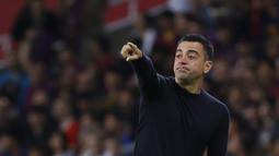 Seperti yang sudah diketahui, Xavi lagi berada dalam masalah besar. Komentarnya terkait keuangan klub dikabarkan membuat Joan Laporta naik pitam. (AP Photo/Joan Monfort)