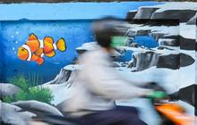FOTO: Kreativitas Seniman Percantik Kawasan Cideng dengan Mural Biota Laut