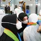 Peluk haru meyambut rombongan jemaah haji kloter 20 asal Kota Batu yang tiba di Masjid Sultan Agung Kota Batu pada Sabtu, 30 Juli 2020&nbsp;