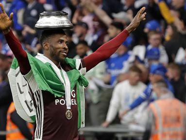 Pemain Leicester City, Kelechi Iheanacho merupakan penyerang berkebangsaan Nigeria. Ia tampil gemilang dan mampu bawa The Foxes juarai FA Cup musim lalu. Pemain 24 tahun ini telah mencatatkan 19 gol dan 5 assit dari 45 penamilannya. (Foto: AFP/Pool/Kirsty Wigglesworth)