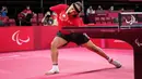 Atlet para-tenis meja Mesir, Ibrahim Elhusseiny Hamadtou mengembalikan bola saat melawan Chao Chen dari China pada laga Group E kelas 6 Tenis Meja Putra Paralimpiade Tokyo 2020 di Tokyo Metropolitan Gymnasium, Jumat (27/8/2021). (Yasuyoshi CHIBA / AFP)