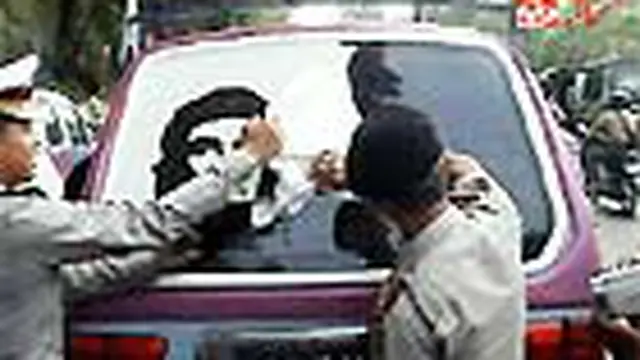 Angkot Berkaca Gelap Dirazia