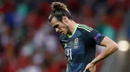 Ekspresi Gareth Bale usai menjalani laga Semi Final Piala Eropa 2016 di Parc Olympique Lyonnais, Perancis, Kamis (7/7). Portugal menang atas Wales dengan skor akhir 2-0. (REUTERS)