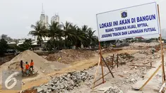 Suasana pengerjaan proyek penataan ulang Kalijodo, Jakarta, Jumat (18/3). Pengerjaan di sepanjang Jalan Kepanduan II, mulai dari ujung di Jalan Teluk Gong, Jakarta Utara, hingga Jalan Tubagus Angke, Jakarta Barat. (Liputan6.com/Gempur M Surya)