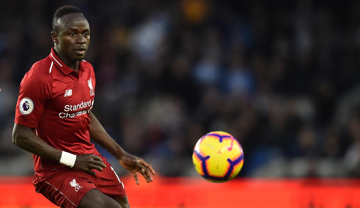 Sadio Mane - Pemain asal Senegal ini menjelma menjadi Penyerang ganas bersama Mohamed Salah dan Firmino di lini depan Liverpool. Selama berseragam The Reds, Mane telah menorehkan 59 gol di kompetisi Premier League. (AFP/Glyn Kirk)