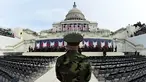 Dirigen bersiap memandu anggota President's Own Marine Band memainkan musik saat gladi resik jelang pelantikan Donald Trump di U.S. Capitol, Washington, DC, AS (19/1). Trump akan menjadi presiden ke-45 AS. (AFP Photo/Timothy A. Clary)