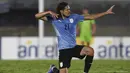 Edinson Cavani. Striker Uruguay berusia 35 tahun ini akan memainkan Piala Dunia keempatnya di Qatar nanti. Dari 3 edisi, 2010 hingga 2018 ia total bermain dalam 14 laga dengan torehan 5 gol dan 2 assist. Prestasi terbaiknya pada 2010 membawa Uruguay finis di posisi ke-4. (AFP/Pool/Pablo Porciuncula)