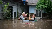 Sejak Kamis (12/9/2024), Siklon Boris telah membawa angin kencang dan hujan deras ke beberapa wilayah Rumania, Austria, Republik Ceko, Hungaria, Polandia, dan Slowakia. (Daniel MIHAILESCU/AFP)