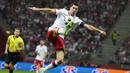 Robert Lewandowski menjadi pemain ketiga pencetak gol terbanyak kualifikasi Piala Dunia 2022 zona Eropa. Ia berhasil membukukan enam gol dan tiga assist dari lima penampilannya bersama Polandia. (Foto: AP/Czarek Sokolowski)