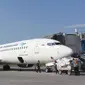 Ilustrasi maskapai penerbangan Garuda Indonesia saat berhenti di apron Bandara Adi Soemarmo.(Liputan6.com/Fajar Abrori)
