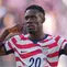 Pemain Amerika Serikat Folarin Balogun melakukan selebrasi aksi setelah mencetak gol pertama timnya selama pertandingan sepak bola babak 32 besar Piala Dunia antara Amerika Serikat dan Bosnia di Santa Clara, California, dekat San Francisco, Rabu, (01/07/2026). (AP Photo/Julio Cortez)