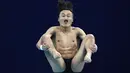 Haram Woo, pelompat indah Korea Selatan, bertanding dalam final Loncat indah putra 3 meter Springboard Olimpiade Tokyo 2020 di Tokyo Aquatics Center, Selasa (3/8/2021). (AP Photo/Alessandra Tarantino)