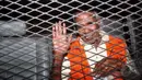 Yesaya Sombuk disangkakan dengan pasal 12 huruf a atau b atau pasal 5 ayat 2 jo pasal 5 ayat 1 a atau b atau pasal 11 Undang-undang No 31 tahun 1999, Jakarta, Rabu (18/6/2014) (Liputan6.com/Faisal R Syam)