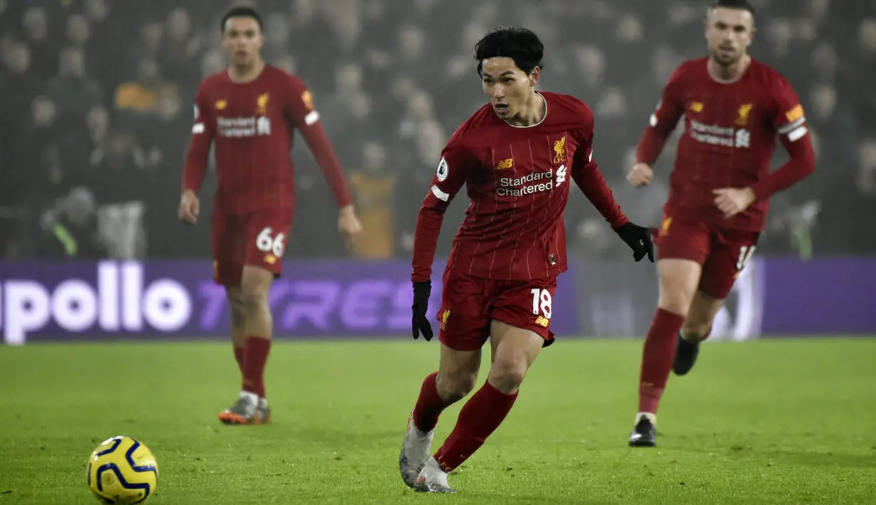 Pemain Liverpool, Takumi Minamino, saat melawan Wolverhampton Wanderers pada laga Premier League di Stadion Molineux, Kamis (23/01/2020). Liverpool menang dengan skor 2-1. (AP/Rui Vieira)