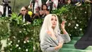 Penampilannya ini mengingatkan pada momen ikoniknya di Met Gala tahun 2022 lalu, ketika Kim Kardashian menghadirkan penampilan yang terinspirasi oleh Marilyn Monroe. (Aliah Anderson / GETTY IMAGES NORTH AMERICA / Getty Images via AFP)