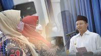 Pelaksana Harian Gubernur Jawa Barat Uu Ruzhanul Ulum saat menghadiri Peringatan Hari Keluarga Nasional (Harganas) Tingkat Provinsi Jawa Barat Ke-29 Tahun 2022, di Aula Barat Gedung Sate, Kota Bandung, Kamis (7/7/2022).