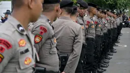 Keputusan ini diambil dalam rapat paripurna yang dihadiri oleh sejumlah Menteri pada Kabinet Merah Putih di DPR RI di Jakarta pada Kamis 20 Maret 2025. (BAY ISMOYO/AFP)
