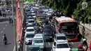 Bus Transjakarta Tanah Abang Explorer terlihat melintasi Jalan KH. Mas Mansyur, Tanah Abang, Jakarta, Jumat (2/2). (Liputan6.com/JohanTallo)