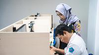Selain fasilitas fisik, berbagai universitas juga menyediakan pengawas UTBK 2025 yang terlatih dalam menangani kebutuhan khusus peserta disabilitas. (Foto: Unesa)