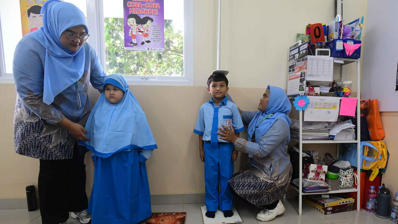 FOTO:  Antusias Murid SD Ikuti Cek Pemeriksaan Gratis di Sekolah
