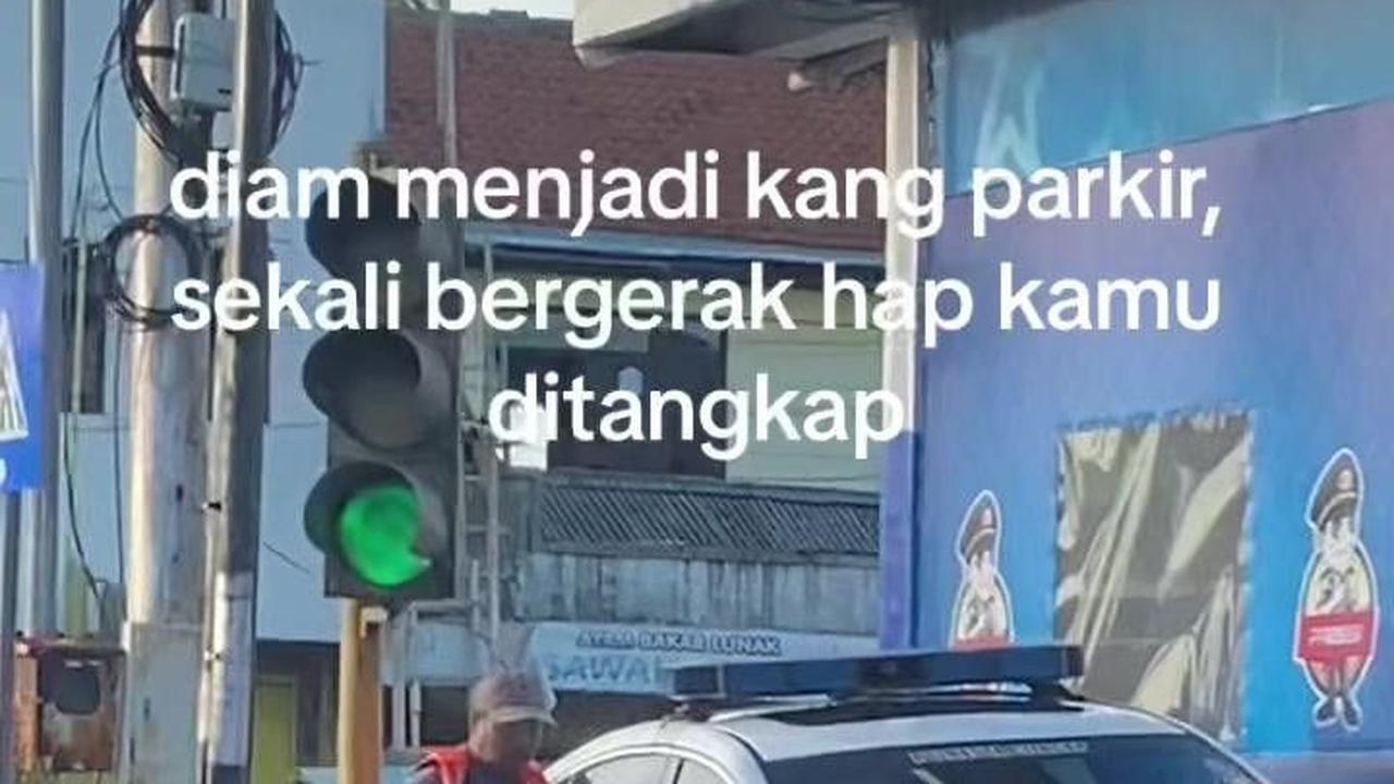 Diduga Penyamaran Polisi Sebagai Tukang Parkir Terekam Warganet