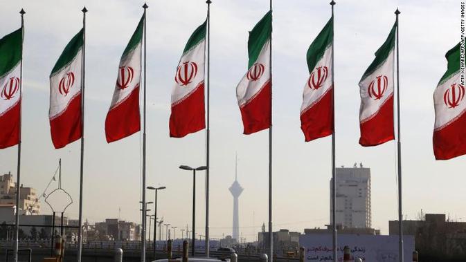 Bendera Iran (Atta Kenare / AFP PHOTO)