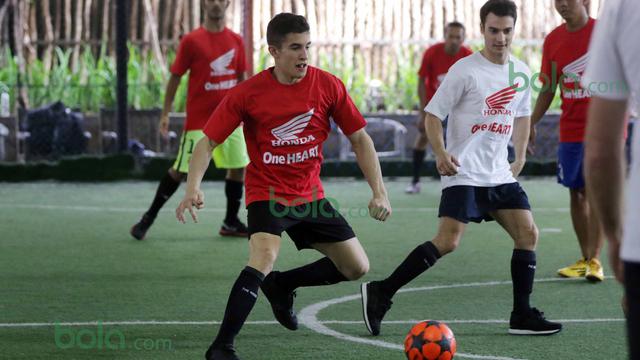 Marc Marquez (kiri) dan Dani Pedrosa