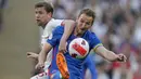 Dua kontestan Piala Dunia 2022 Inggris dan Swiss melakoni pertandingan uji coba di Wembley Stadium pada Minggu (27/3/2022). (AP/Alastair Grant)