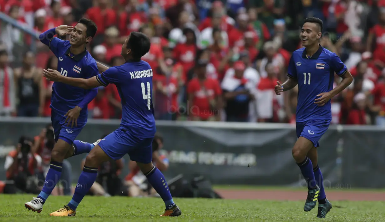 Gelandang Timnas Thailand melakukan selebrasi kontra Indonesia di gelaran SEA Games 2017 yang berlangsung di Stadion Shah Alam, Malaysia (Bola.com/Vitalis Yogi Trisna)