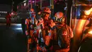 Para pengungsi tiba di tempat penampungan setelah meninggalkan desa mereka menyusul letusan gunung berapi Fuego di Alotenango, Guatemala, Senin, 3 Agustus 2026. (AFP/Johan Ordonez)
