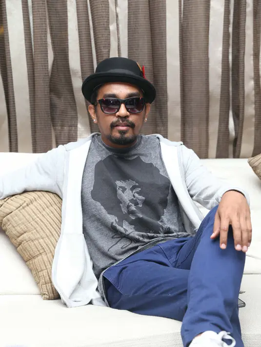 Musisi Glenn Fredly enggan berkomentar mengenai kandasnya hubungannya dengan penyanyi seksi Aura Kasih. (Andy Masela/Bintang.com)
