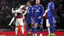 Striker Arsenal, Pierre-Emerick Aubameyang, merayakan gol ke gawang Cardiff City pada laga Premier League di Stadion Emirates, Rabu (30/1). Arsenal menang 2-1 atas Cardiff City. (AP/Nick Potts)