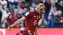 Robert Lewandowski - Bayern Munchen sukses merebut poin penuh kala bertandang ke markas Union Berlin dalam lanjutan Bundesliga.  Robert Lewandowski menyumbang dua diantara lima gol kemenangan Die Roten. (AFP/Christof Stache)