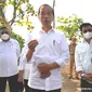 Presiden Joko Widodo (Jokowi) saat berkunjung ke Desa Giriroto, Boyolali, Jawa Tengah, untuk melakukan penanaman bibit kelapa genjah.