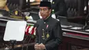 Jokowi melanjutkan tradisi berbaju adat di Sidang Tahunan MPR terakhirnya sebagai Kepala Negara, Jumat pagi (16/8/2024). (AP Photo/Tatan Syuflana, Pool)