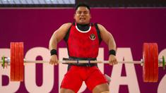 Lifter Indonesia, Muhammad Zul Ilmi berkompetisi pada nomor angkat besi putra 89kg SEA Games 2023 di Hanoi Sports Training and Competition Center, Hanoi, Vietnam, Minggu (22/5/2022). Zul meraih medali perak setelah melakukan total angkatan 328kg (145kg snatch dan 183kg clean & jerk). (AP Photo/Tatan Syuflana)