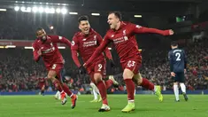 Liverpool memiliki catatan kebobolan hanya 22 kali pada Liga Inggris musim 2018/2019. Catatan itu tak lepas dari jasa penjaga gawang mereka, Alisson yang berhasil torehkan 21 clean sheet. Pada musim itu, The Reds berhasil menempati urutan kedua. (Foto: AFP/Paul Ellis)
